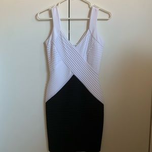 Never worn black and white Calvin Klein form fitted mini dress.